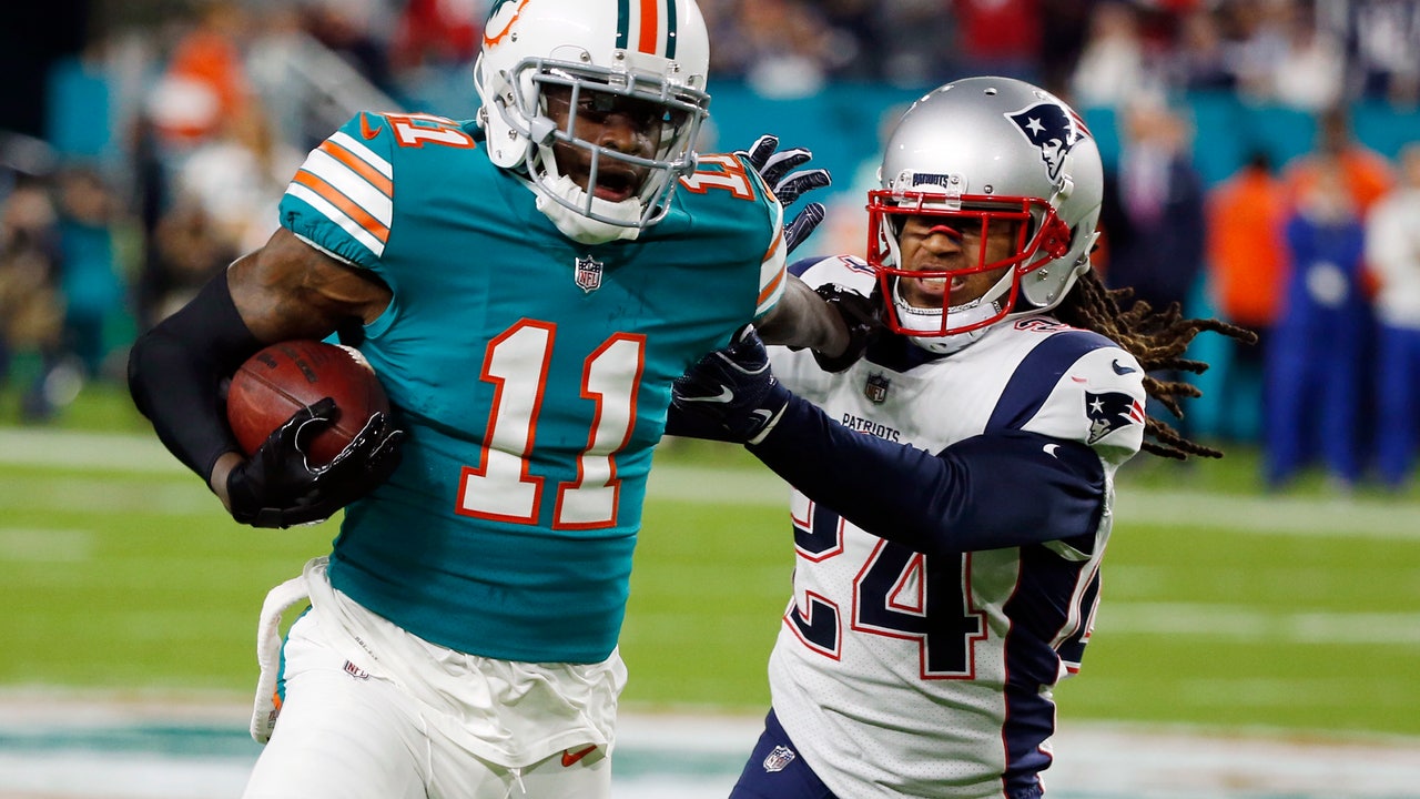 Injury-plagued Dolphins seek lift from underachieving Parker